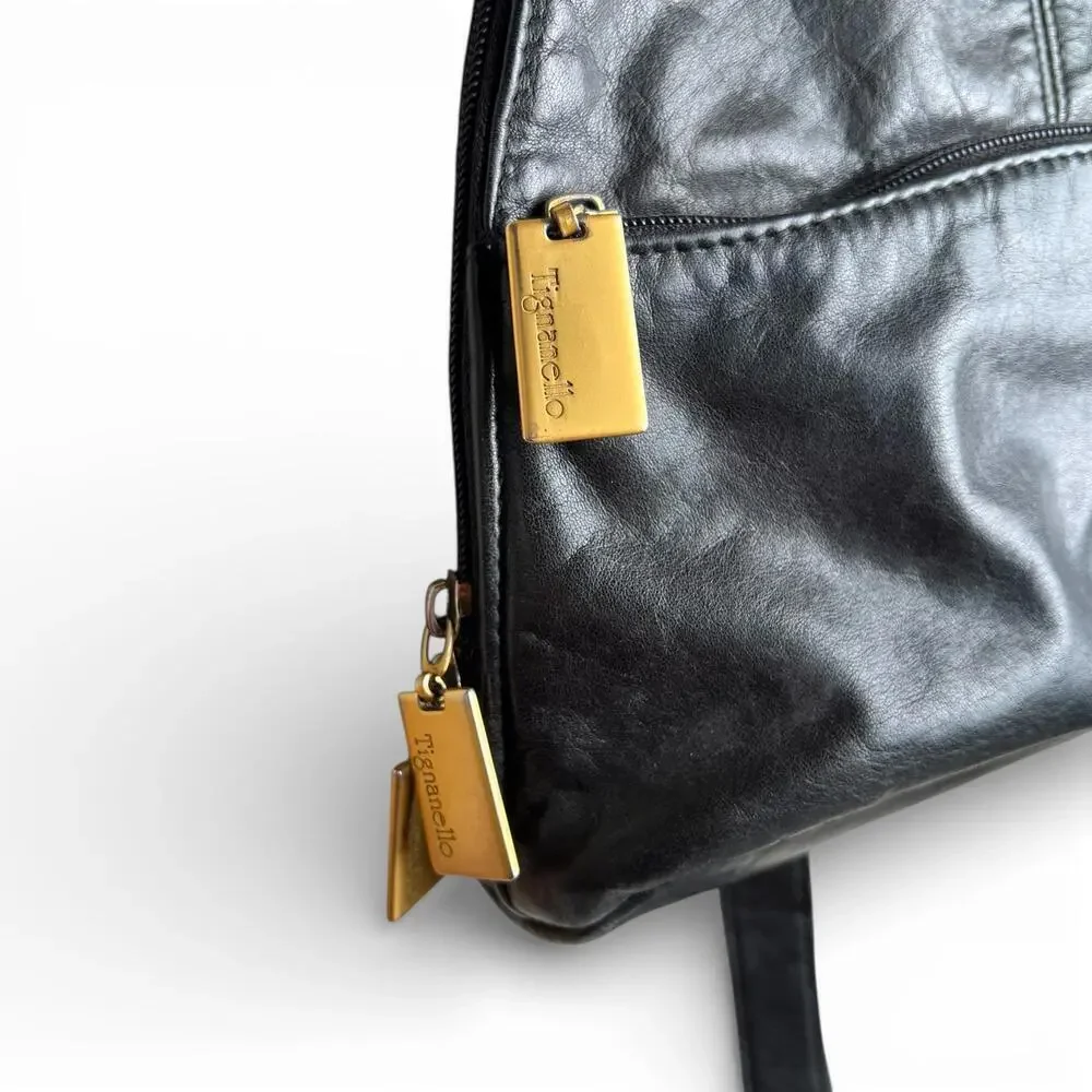 Vintage Tignanello Black Faux Leather Crossbody Backpack with Gold Hardware